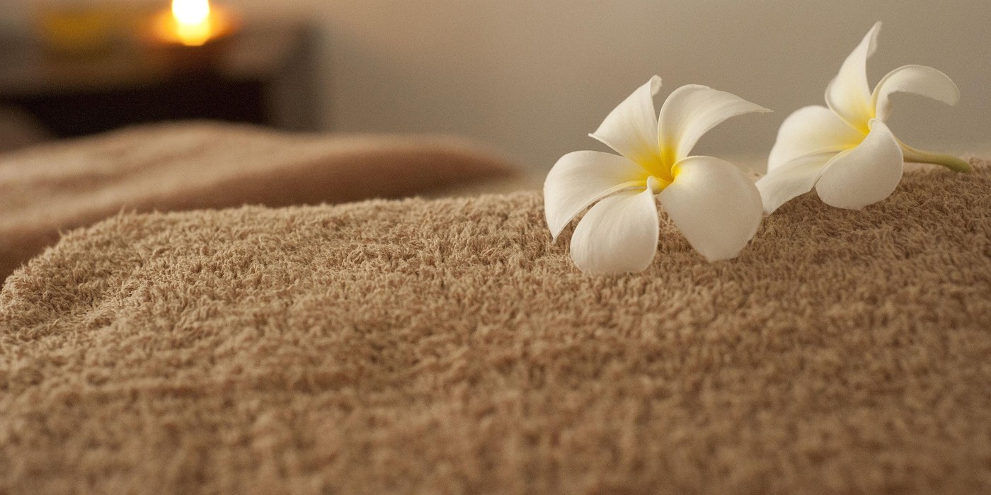 Rückenmassage und Fußmassage